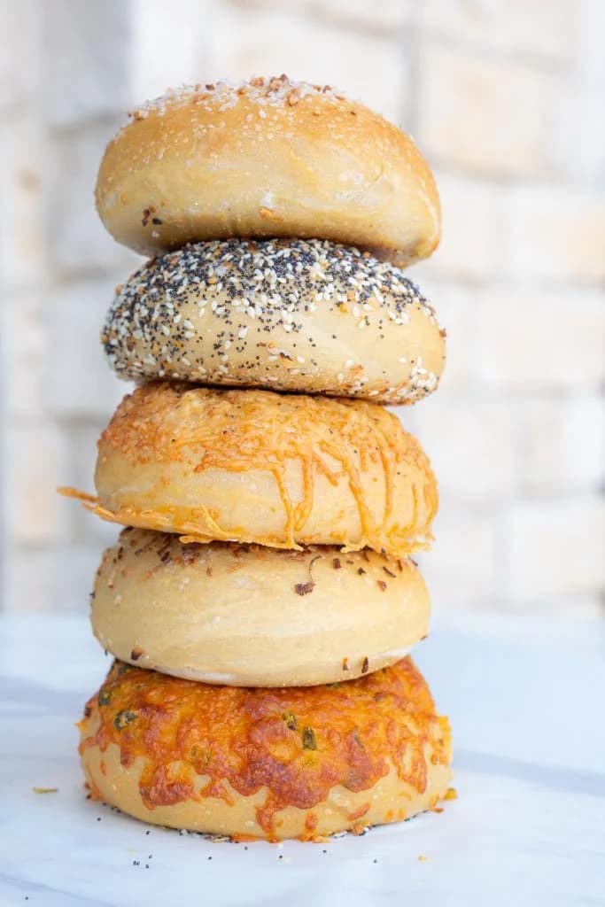 A professional stack of Dan's Bagels bagels