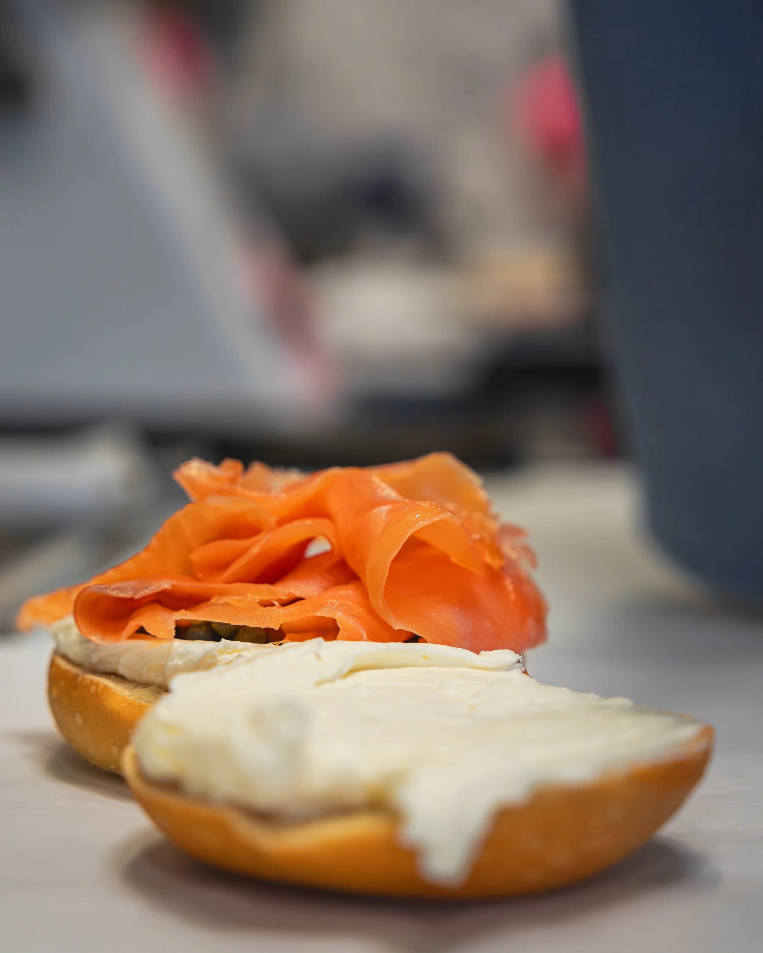 Dan's Bagels signature lox bagel with cream cheese, capers, and fresh tomato