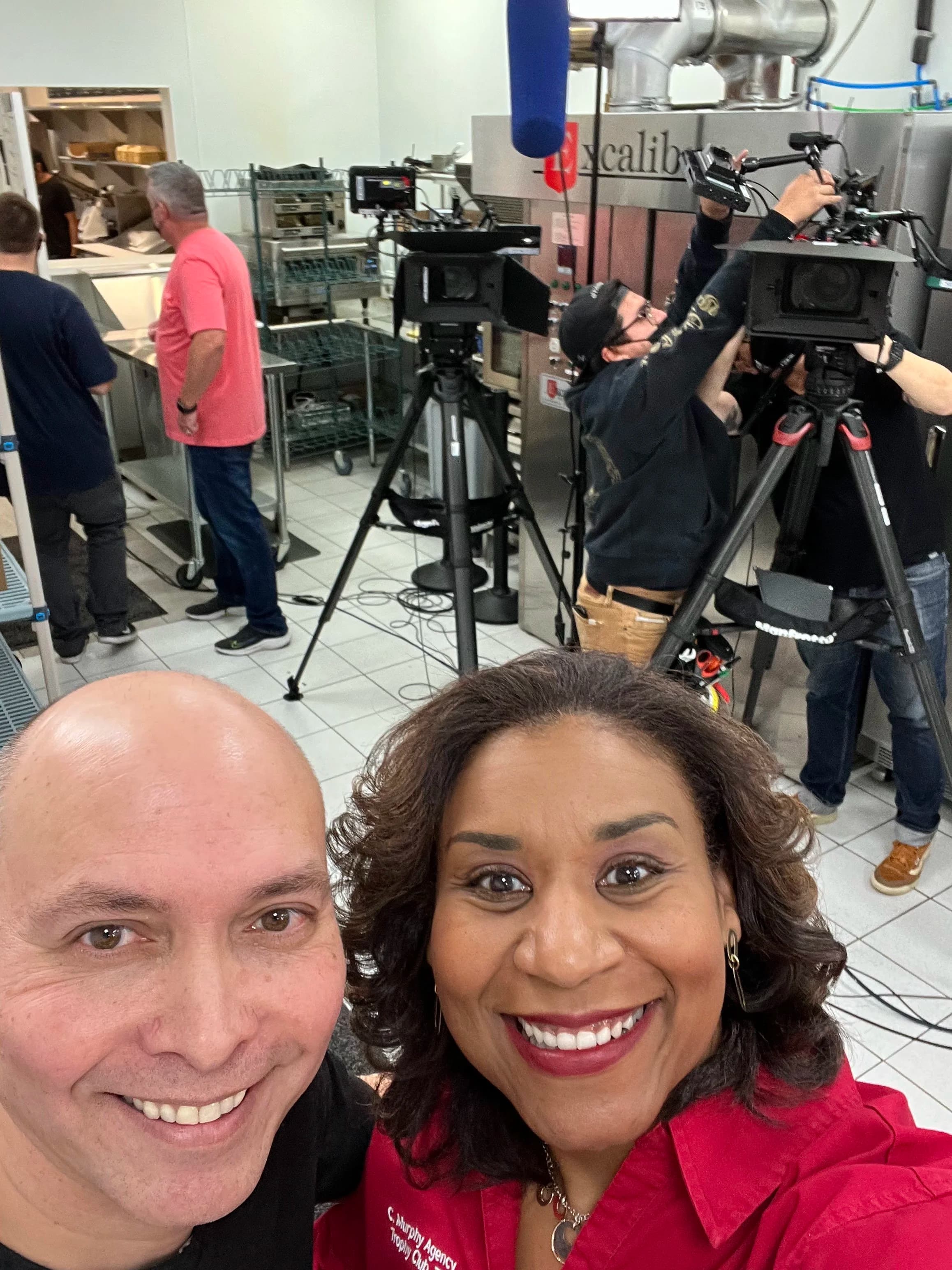 News crew filming Dan Hilbert in the Dan's Bagels kitchen